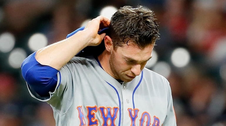 Steven Matz of the New York Mets is pulled in the...