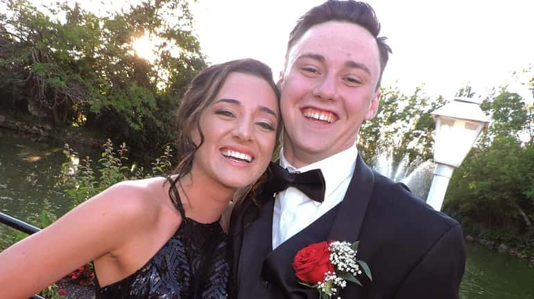 Mineola High School senior Genevieve Peters was prom-posed to by...