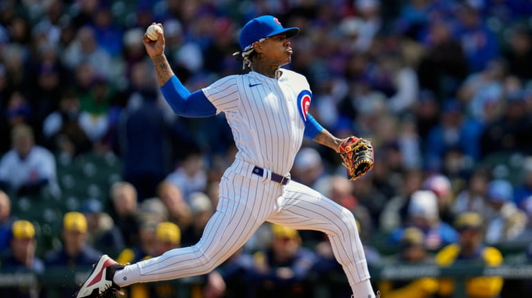 Chicago Cubs starting pitcher Marcus Stroman throws during the first...