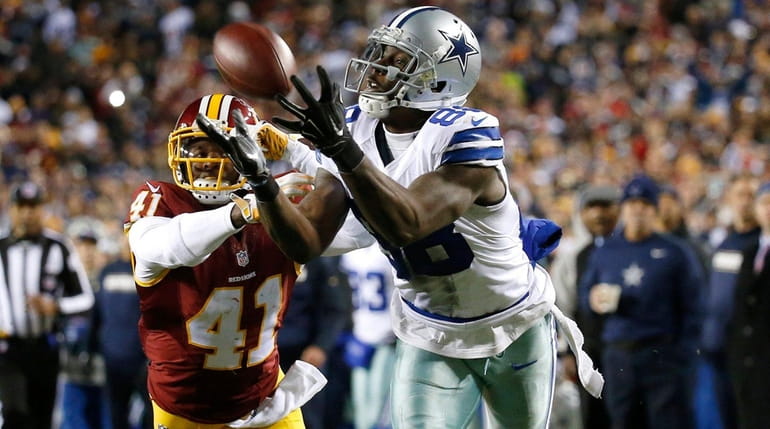 Wide receiver Dez Bryant of the Dallas Cowboys catches the...