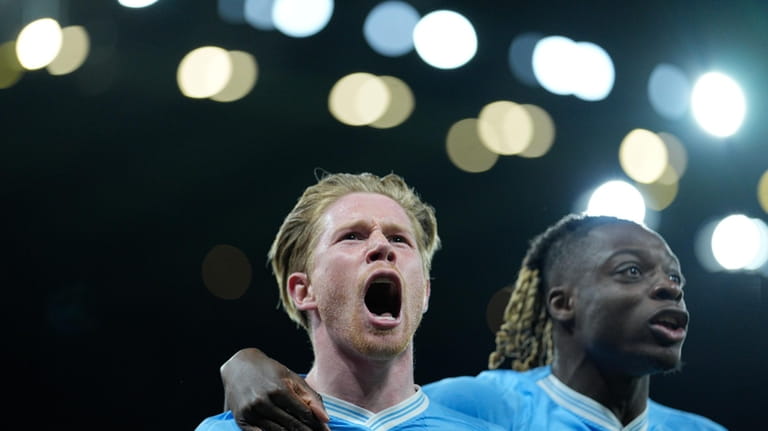 Manchester City's Kevin De Bruyne celebrates after scoring his side's...