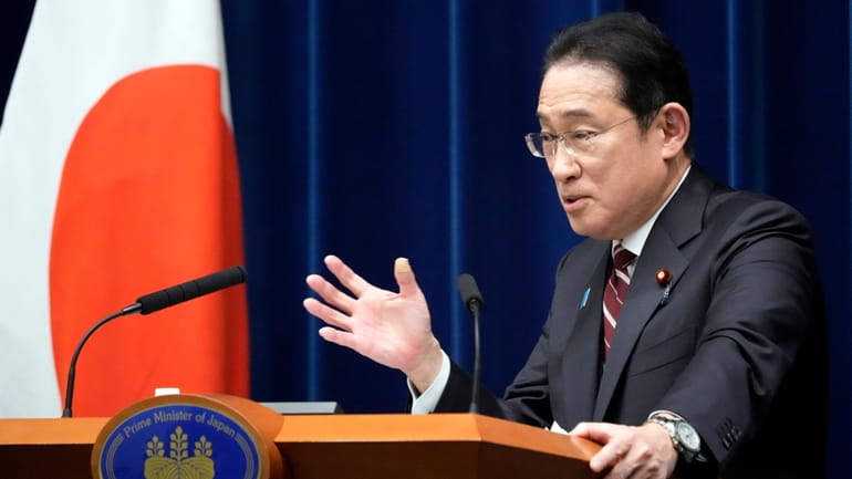Japan's Prime Minister Fumio Kishida speaks during a press conference,...