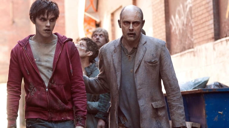 From left, Nicholas Hoult and Rob Corddry in a scene...
