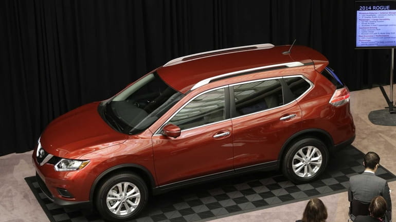 The Nissan 2014 Rogue is unveiled in Farmington Hills, Mich....
