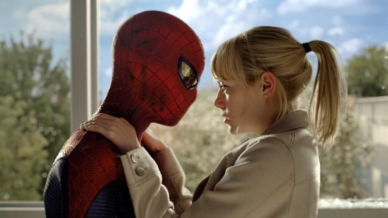 Andrew Garfield as Peter Parker and Spider-Man, and Emma Stone...