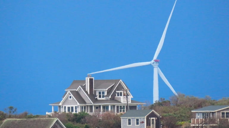Offshore wind turbines are seen in this Block Island, R.I., wind...