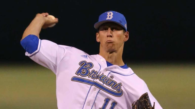 James Kaprielian (11) of the UCLA Bruins pitches during a...
