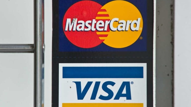 Credit card giants Visa and MasterCard were scrambling to thwart...