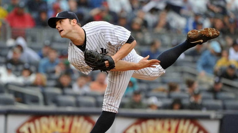 New York Yankees relief pitcher David Robertson throws in the...