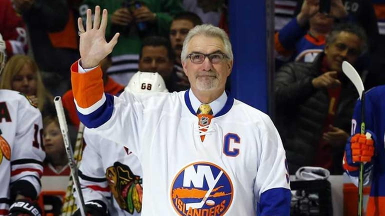 Former New York Islander Clark Gillies is honored before a...