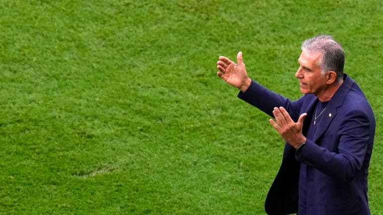 Iran's head coach Carlos Queiroz reacts during the World Cup...
