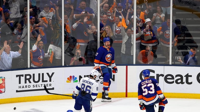 Matt Martin #17 of the Islanders celebrates after scoring against the...