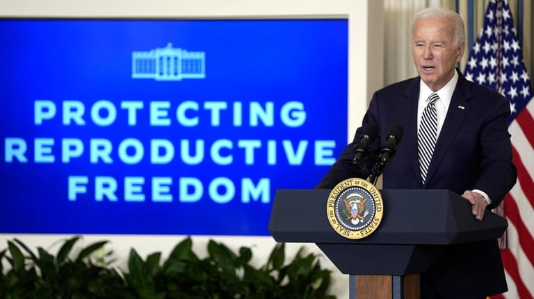 President Joe Biden speaks during a meeting in the White...