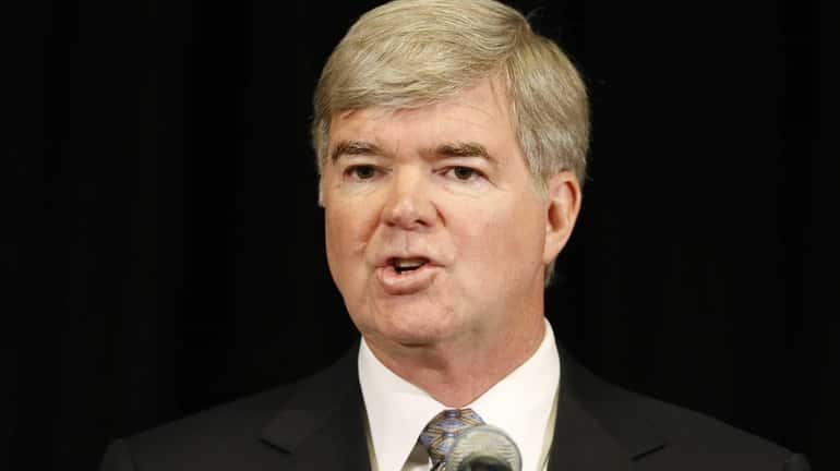 NCAA president Mark Emmert speaks during a press conference at...