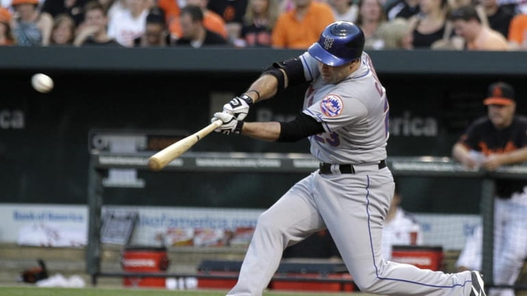 New York Mets' Chris Carter connects for a three-run homer...