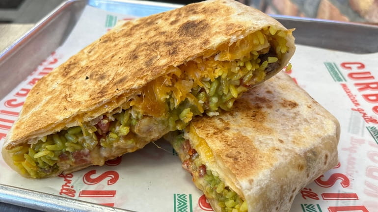 The Maui Waui Crunchwrap at Curbside Mexican Grill in South...