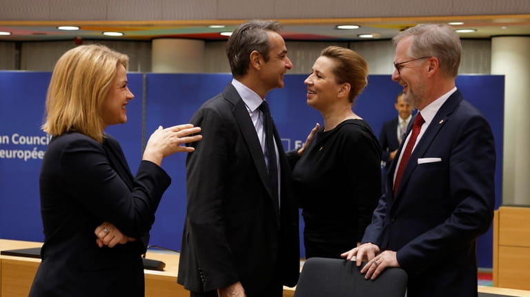 From left, Latvia's Prime Minister Evika Silina, Greece's Prime Minister...