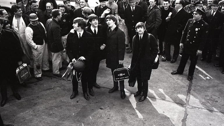 The Beatles at Kennedy Airport after arriving in the U.S....