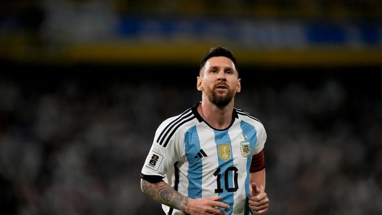 Argentina's Lionel Messi runs during a qualifying soccer match for...
