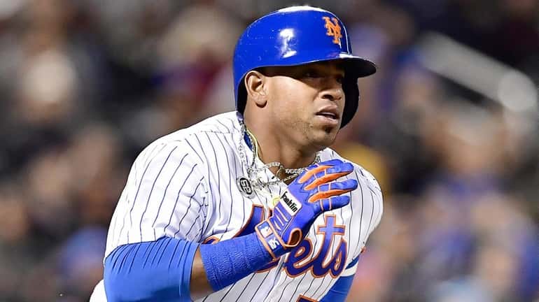 Yoenis Cespedes #52 of the New York Mets hits a...