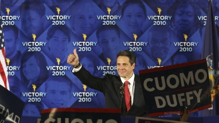 Democratic candidate for governor of New York Andrew Cuomo gestures...