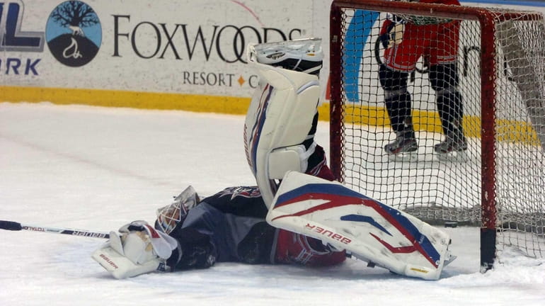 Henrik Lundqvist makes a save during practice at the MSG...