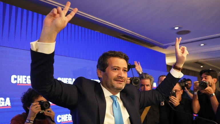 Andre Ventura, leader of populist right wing party Chega, gestures...
