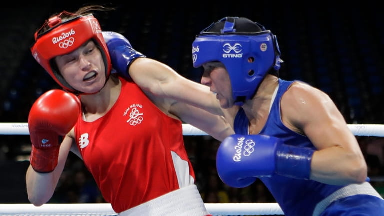 Finland's Mira Potkonen, right, fights Ireland's Katie Taylor during a...
