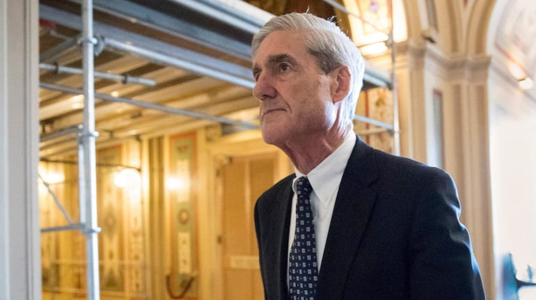 Special counsel Robert Mueller departs after a meeting on Capitol...