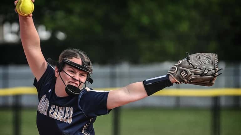 Bethpage high school softball pitcher Stephanie Pilnacek throws during her...