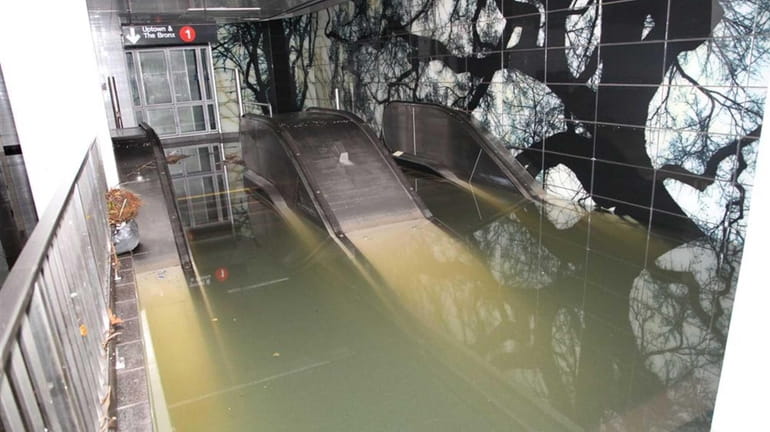 Flooded escalator in the South Ferry station of the No....