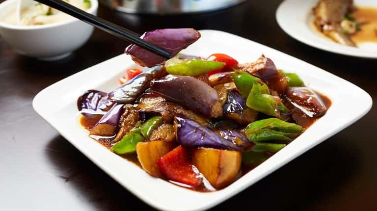 Triple delight vegetables with eggplant, peppers, and potatoes at New...