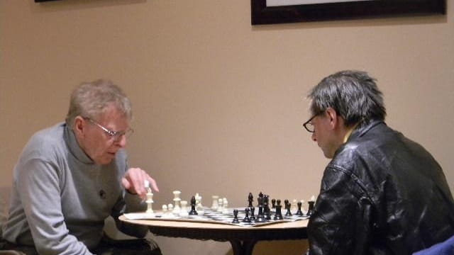 Charlie Evrard (left) squares off against Henry Despres during the...