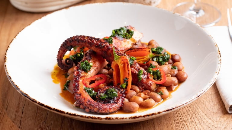 Grilled Spanish octopus with chorizo, fresno chilies and cranberry beans,...