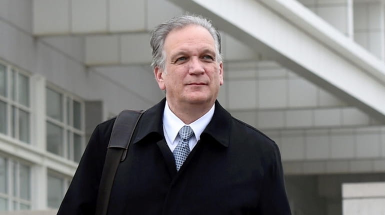 Former Nassau County Executive Edward Mangano leaves federal court in...