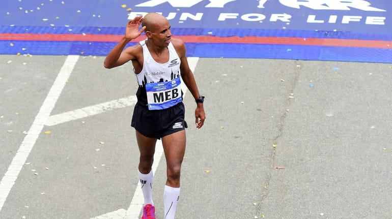 Meb Keflezighi of the United States finishes seventh as the...