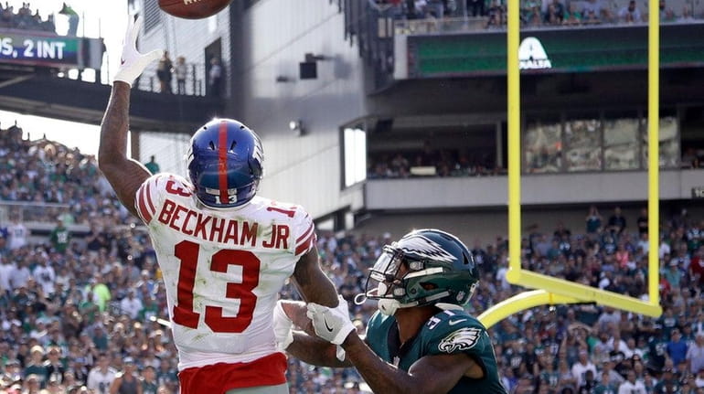 New York Giants' Odell Beckham catches a touchdown pass against...