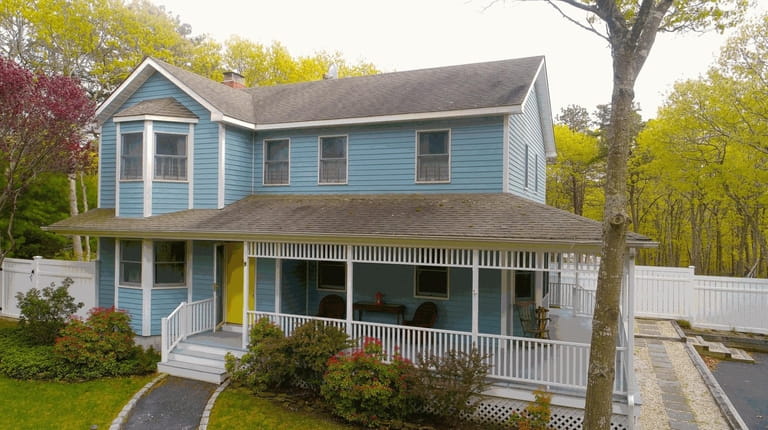 This Hampton Bays property is adjacent to Hubbard County Park.