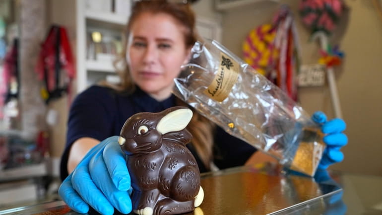 Niaz Mardan wraps a luxury handmade Belgian chocolate rabbit at...