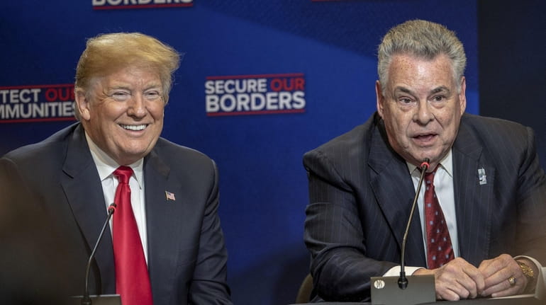 President Donald Trump and Rep. Peter King during a visit...