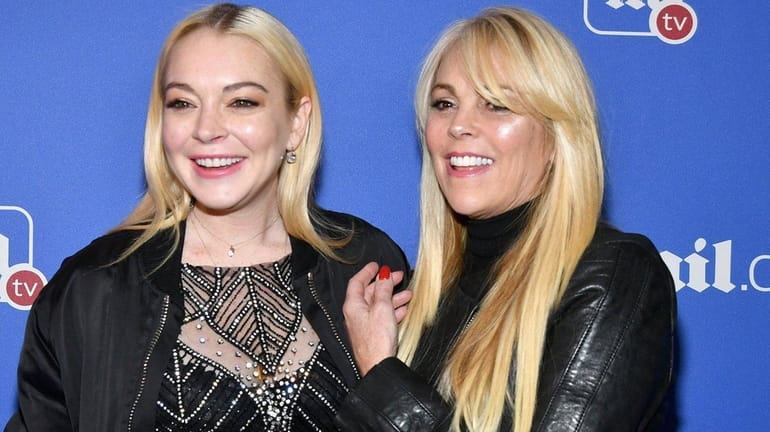 Lindsay Lohan and her mother Dina Lohan attend a holiday...