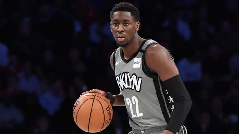 Nets guard Caris LeVert controls the ball against the Oklahoma...