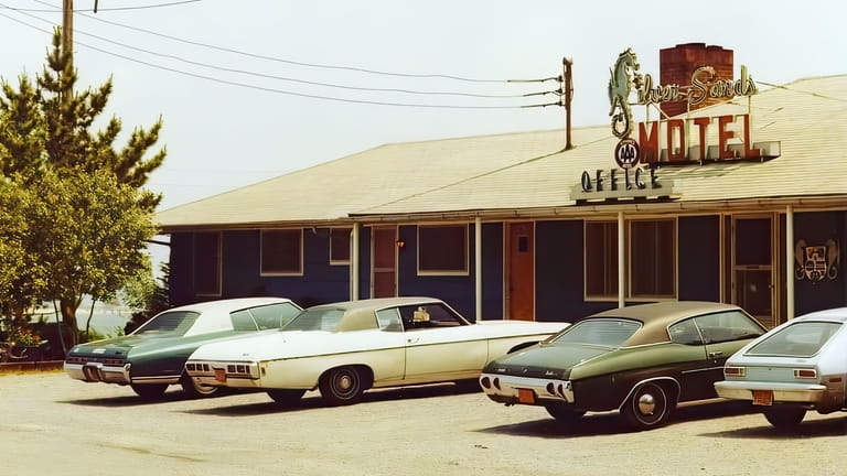 1970s cars are parked at the iconic Silver Sands motel.