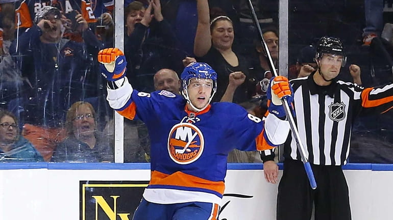 Nikolai Kulemin of the New York Islanders celebrates his second-period...