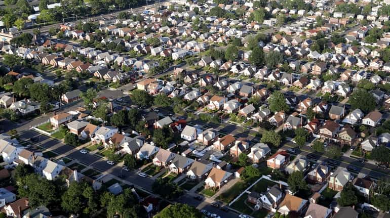 A neighborhood of houses in Elmont in an aerial photo...