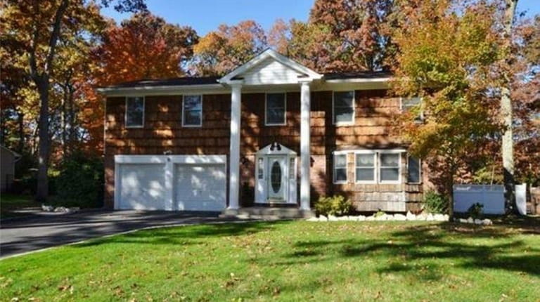 This four-bedroom Colonial, listed for $624,000 in March 2013, is...