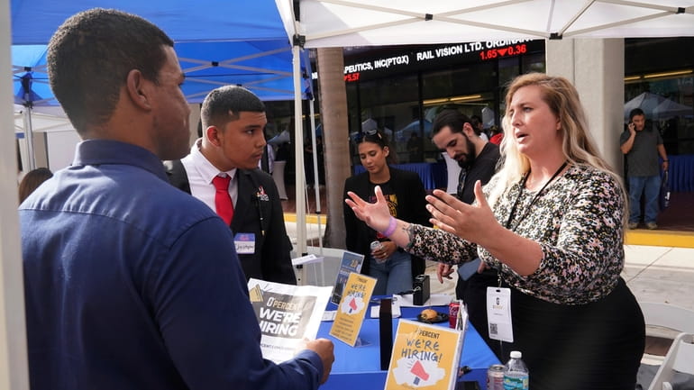 Job-seekers at the Venture Miami Tech Hiring Fair in April,...