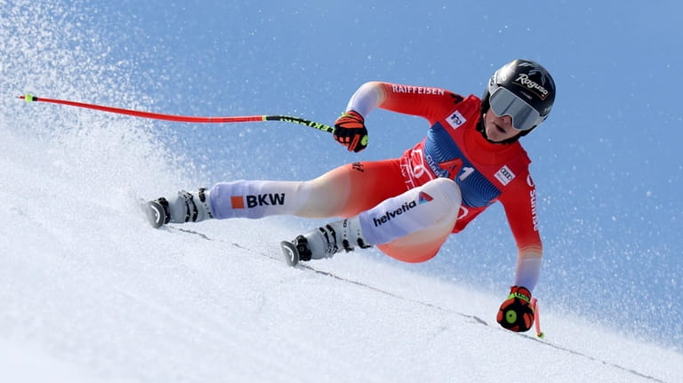 Switzerland's Lara Gut Behrami speeds down the course during an...