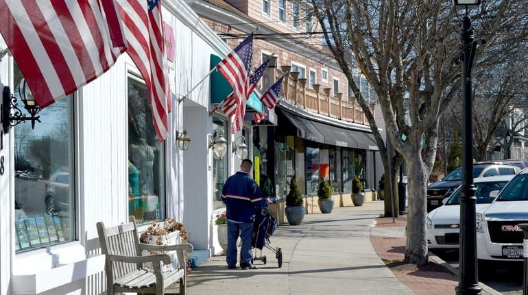Shops line Main Street in Westhampton Beach, a tight-knit community...
