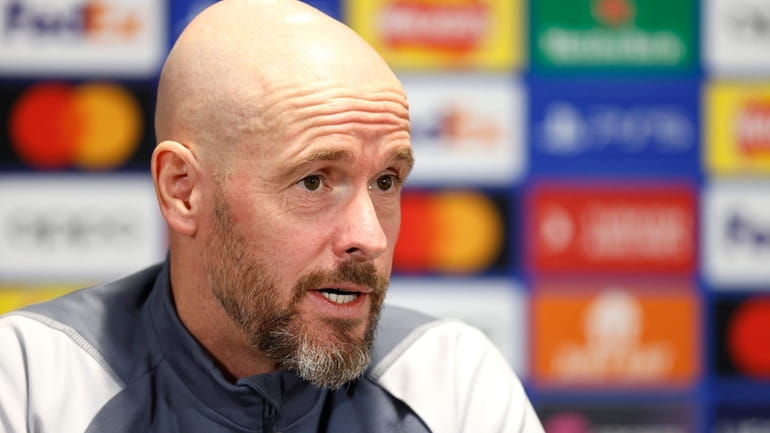 Manchester United manager Erik ten Hag attends a press conference...